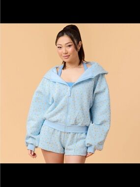 New Blogilates Blue and orange Hoodie with floral design size medium